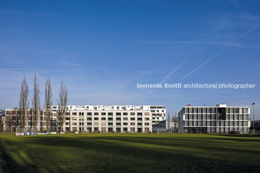 emmi-main office and apartment complex rüssli architekten