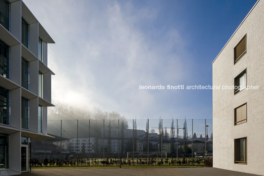 emmi-main office and apartment complex rüssli architekten